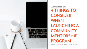 A white coffee cup and pad of paper sit next to powered off laptop. Community 101: 4 things to consider when launching a community mentorship program